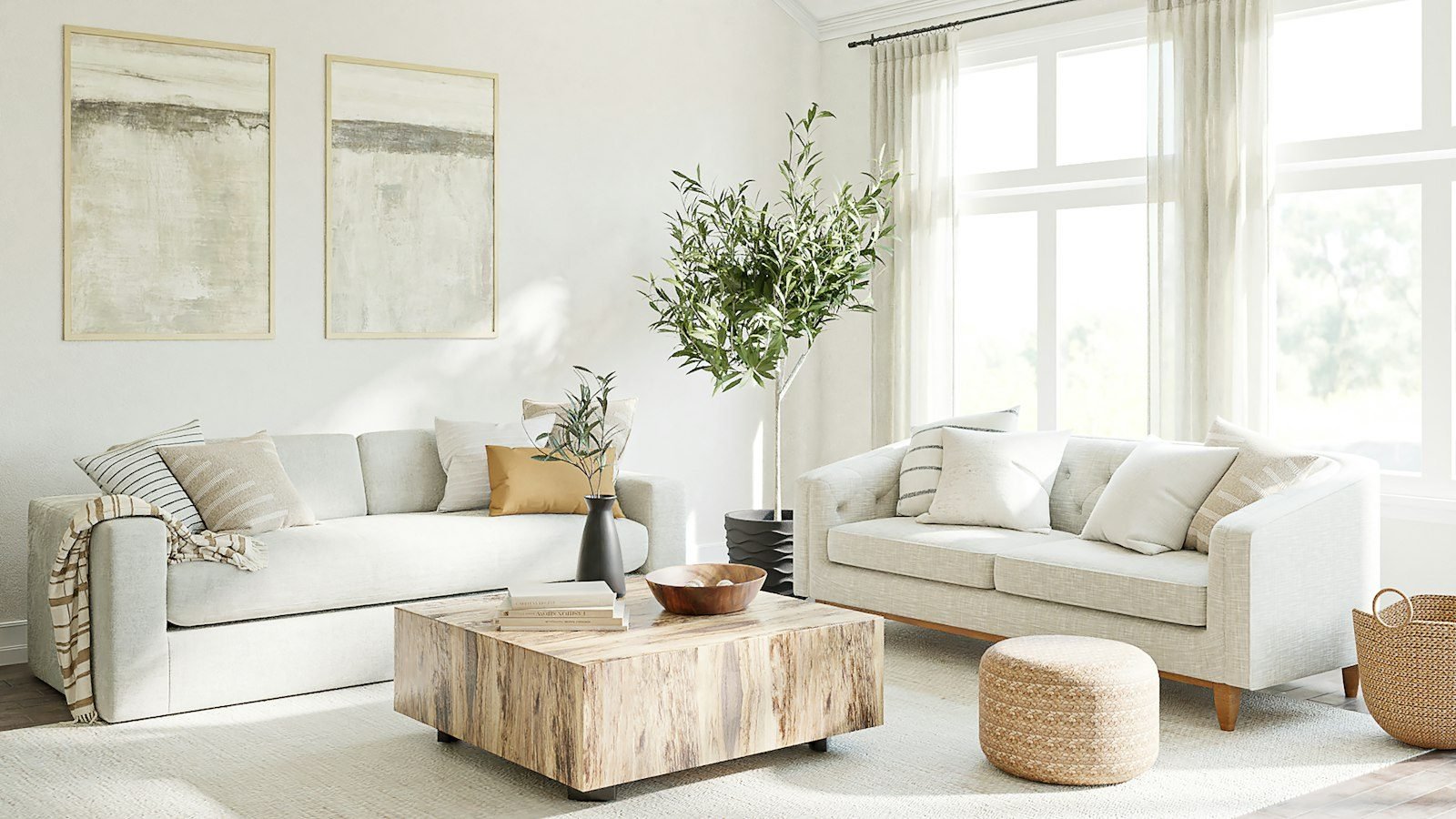 Bright living room with two sofas facing each other, a wooden coffee table and large windows